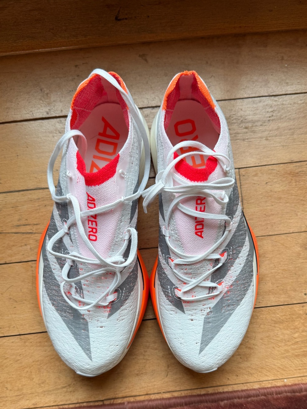 adidas Adizero Racing Shoes in White & Orange